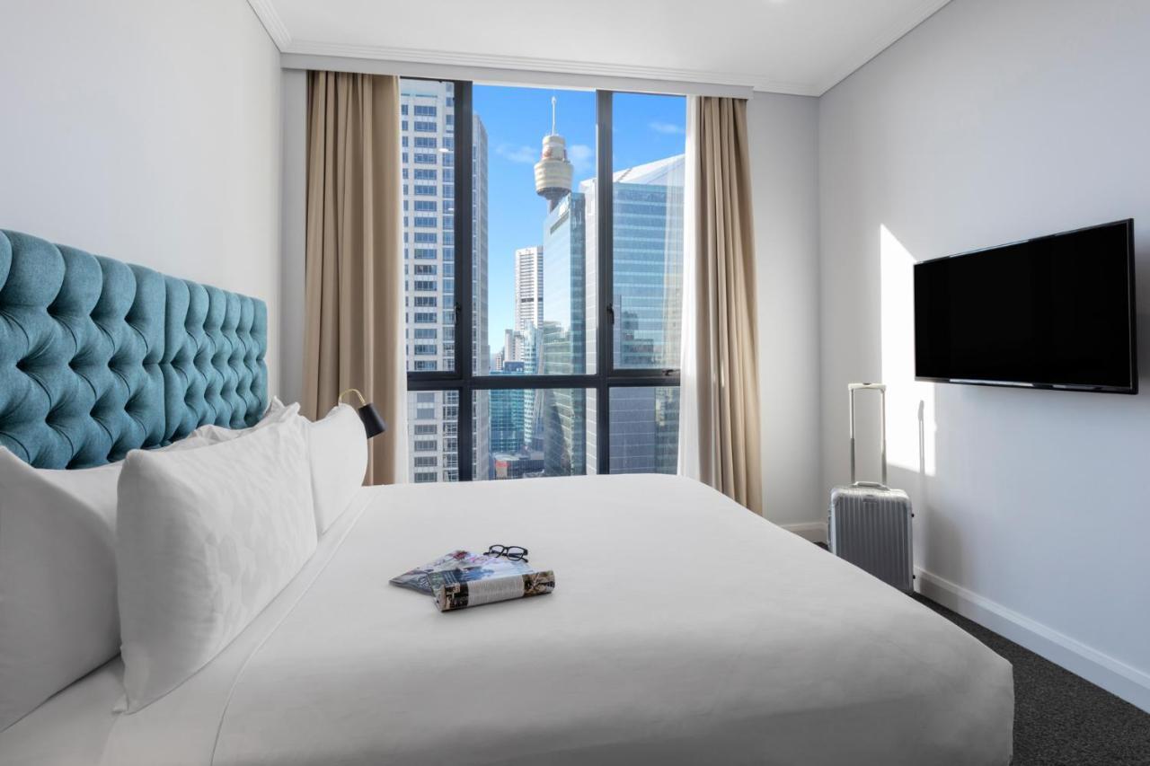 Meriton Suites Pitt Street, Sydney Exteriör bild A bedroom at the hotel