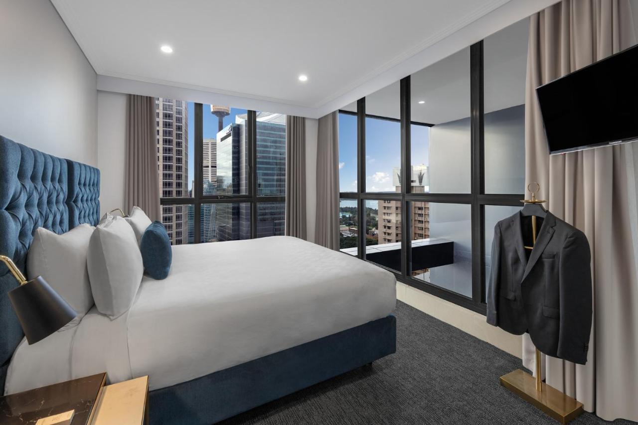 Meriton Suites Pitt Street, Sydney Exteriör bild A bedroom at the hotel