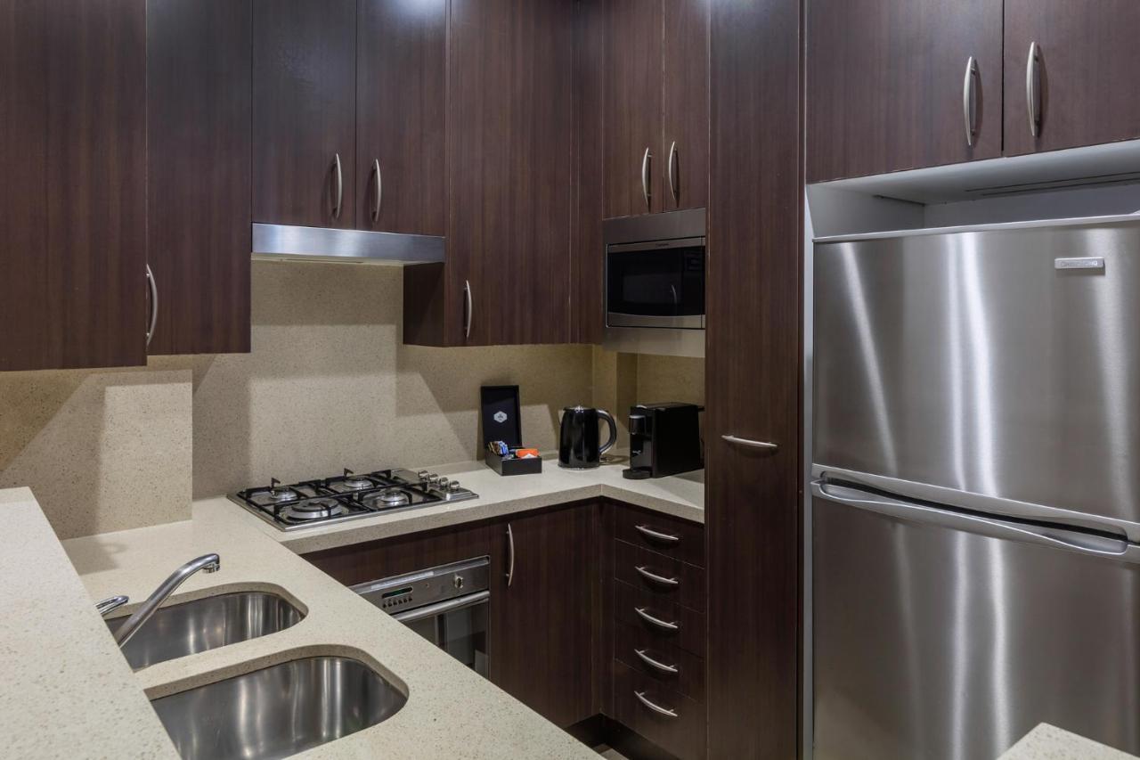 Meriton Suites Pitt Street, Sydney Exteriör bild A typical kitchen in a serviced apartment